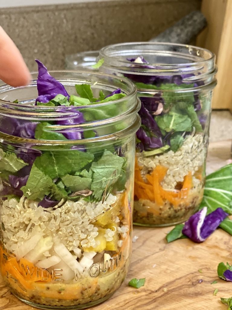 Packing greens in the jar salad