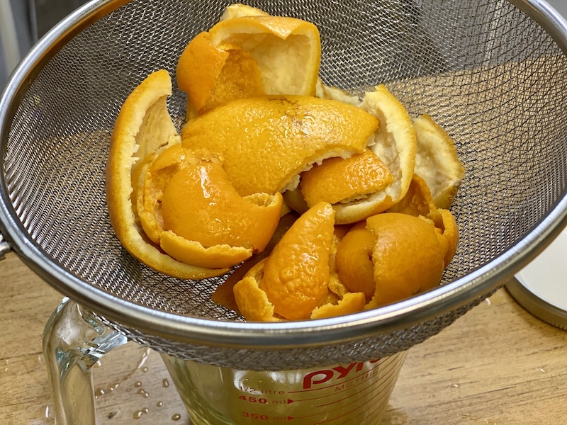 orange peels in strainer